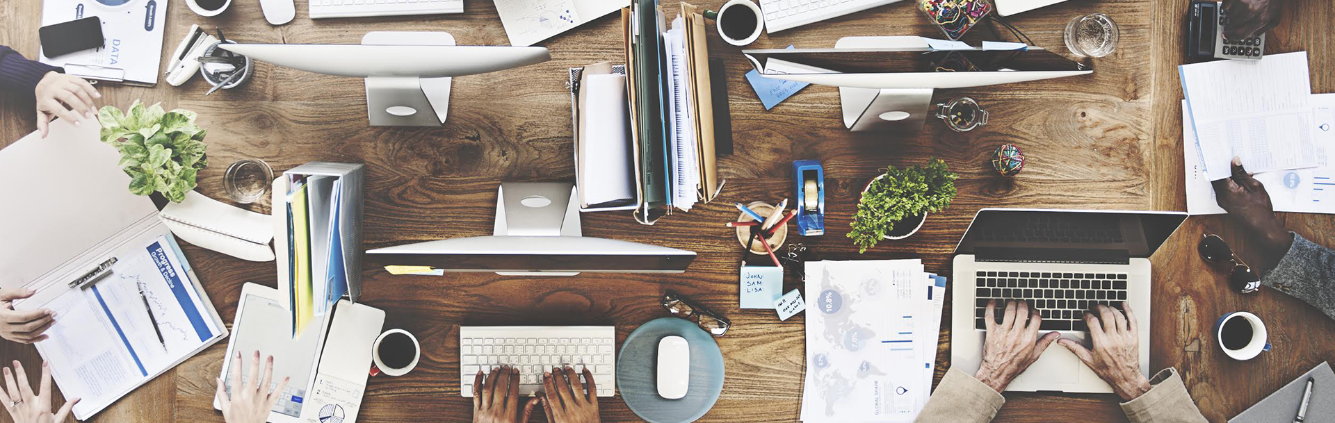 Abstract image of business people at table